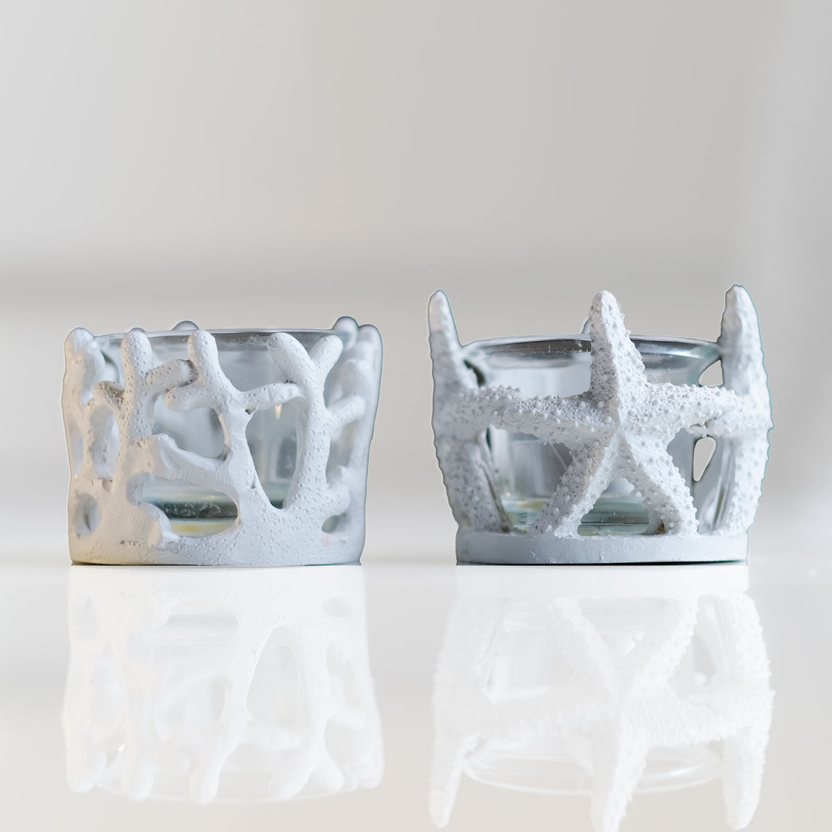 Seastory.co Seashell handmade mirror and home decor products, candle holders and seashell art