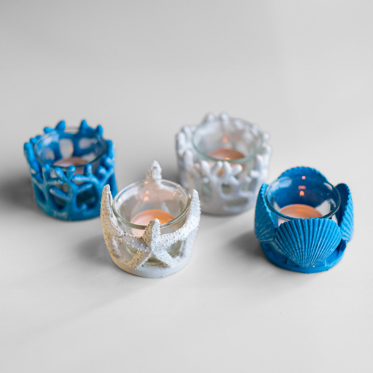 Seastory.co Seashell handmade mirror and home decor products, candle holders and seashell art