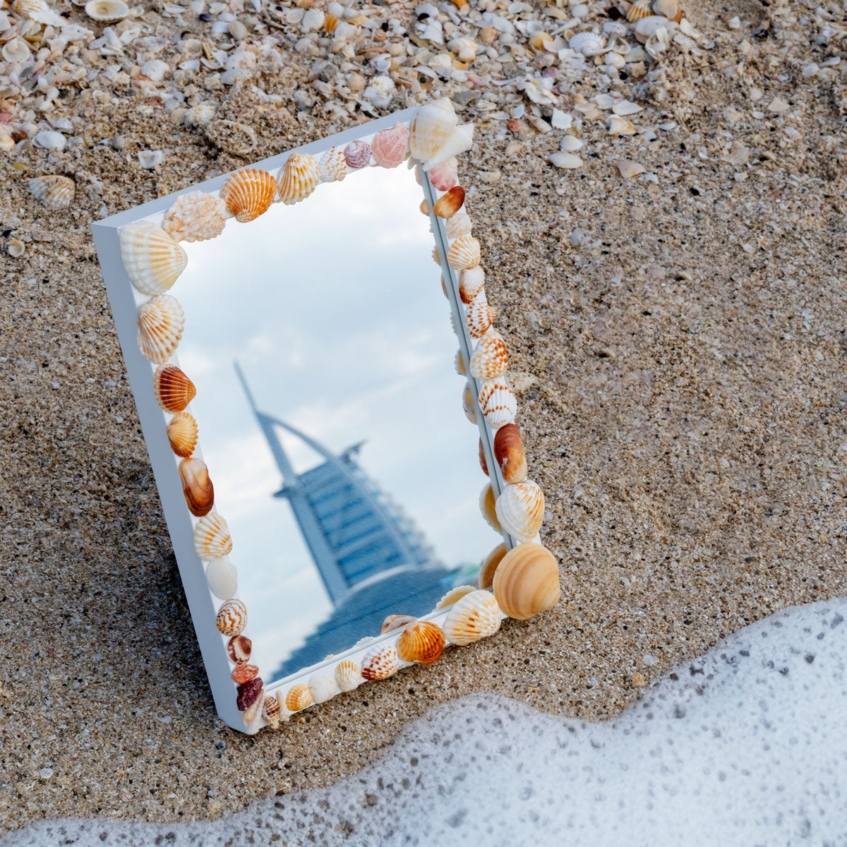 Seastory.co Seashell handmade mirror and home decor products, candle holders and seashell art