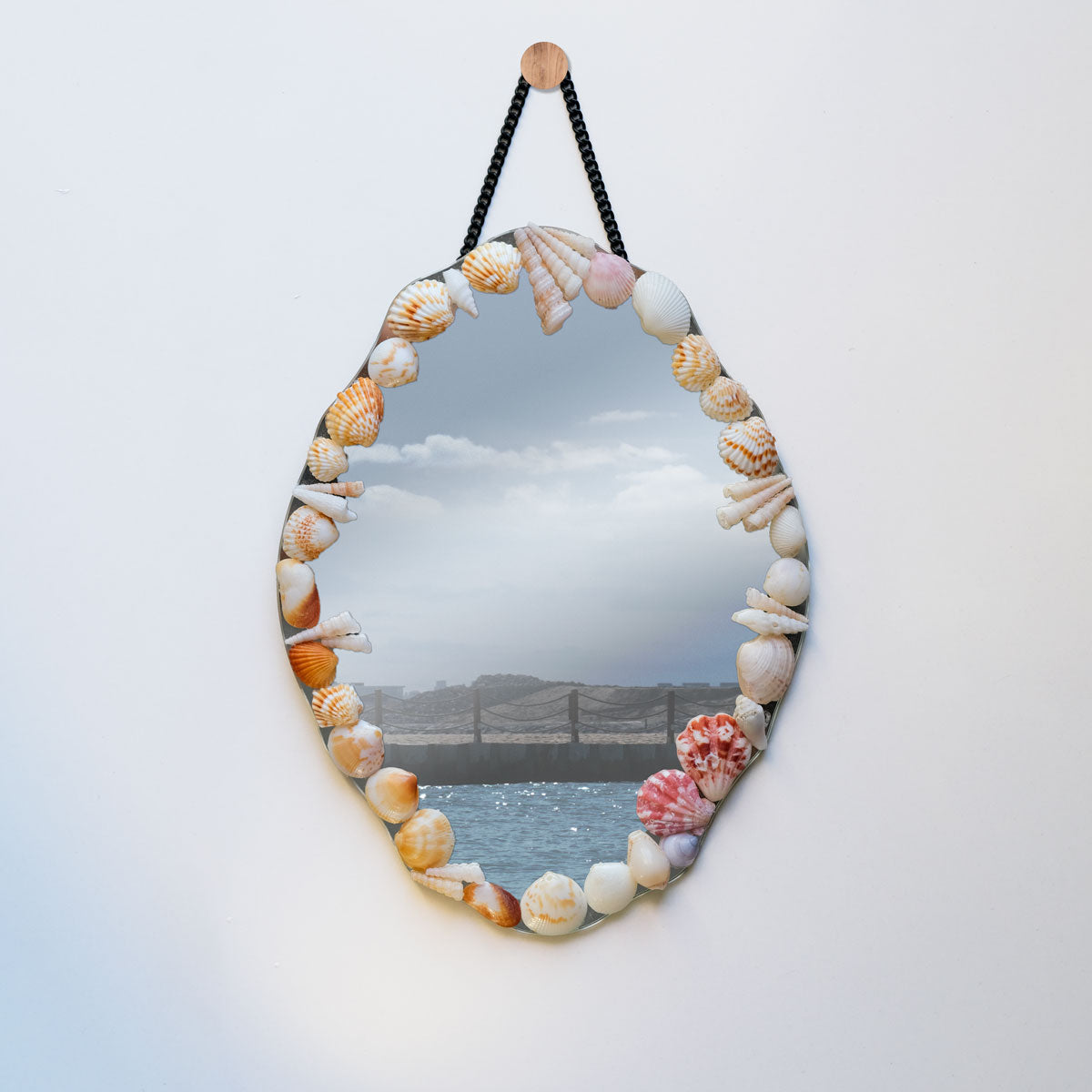 Seastory.co Seashell handmade mirror and home decor products, candle holders and seashell art 